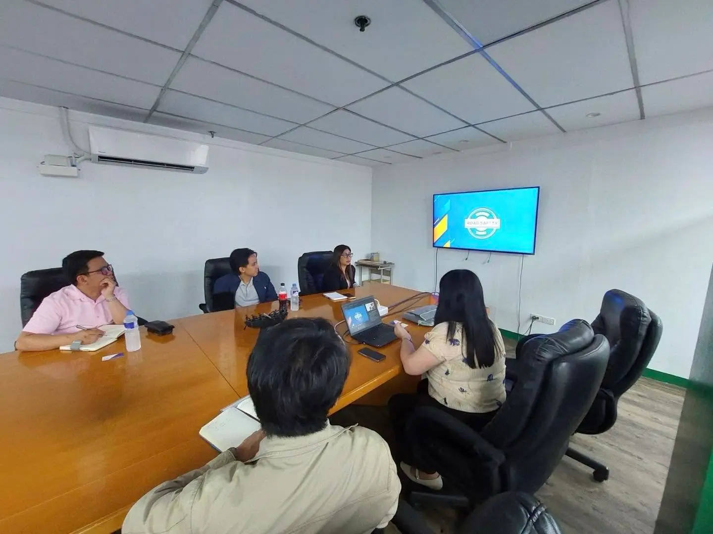 PEMAP and MPTC representatives discussing support for logistics operations